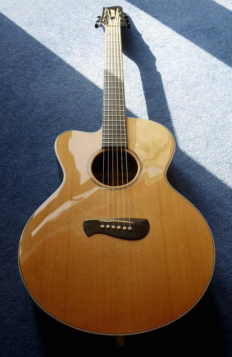 leisure activities brown acoustic guitar musical instrument